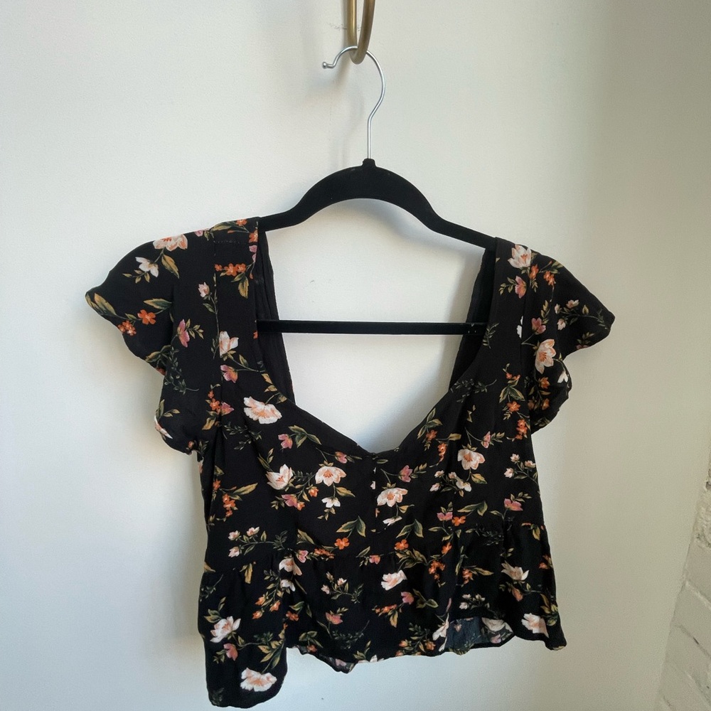 Flowy cropped peplum style delicate ruffly sleeve blouse
